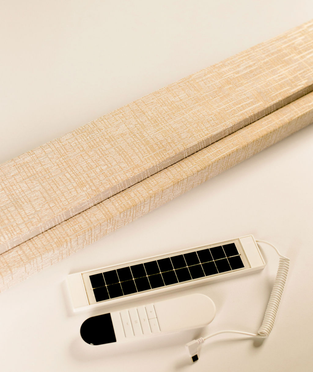 Motorised blind with solar panel charging kit